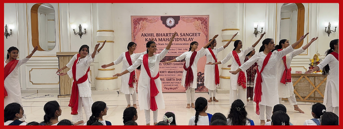 ABSKM students performing a group classical dance on stage