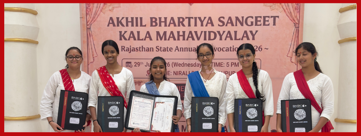 ABSKM students in graduation robes holding certificates at a convocation ceremony