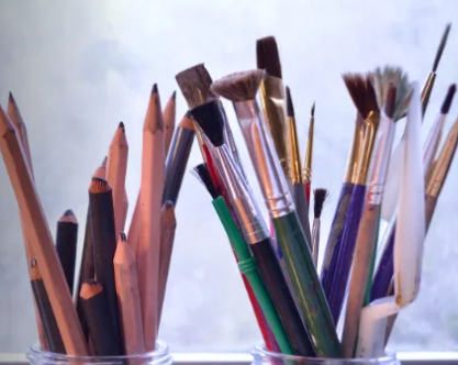 Young students working on fine-arts and craft activities